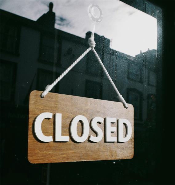 Closed sign hanging on glass door Photo by Lisa from Pexels: https://www.pexels.com/photo/closed-sign-hanging-on-glass-door-29055440/